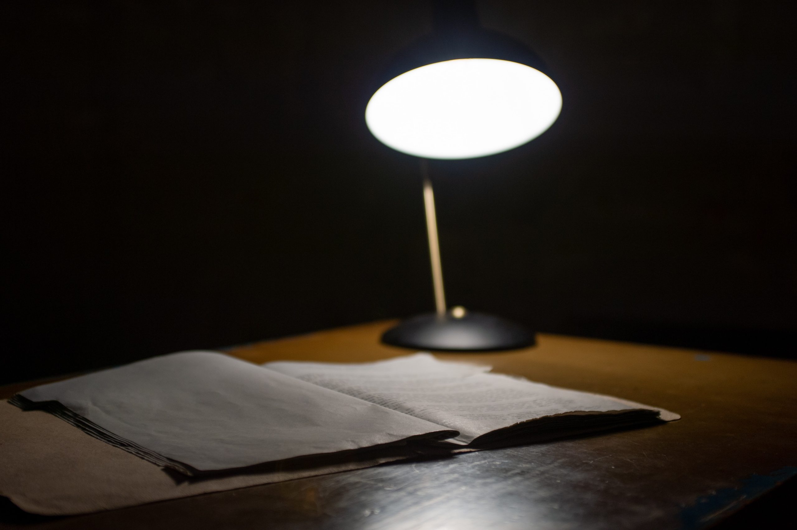 legal process papers under a lamp